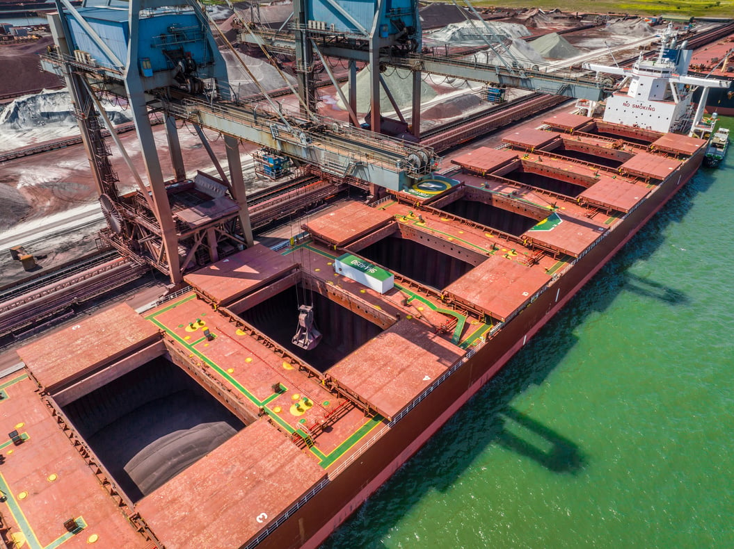 Bulk Carrier Ship Offloading Cargo By Crane for Processing